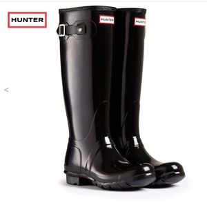 Glossy black hunter boots